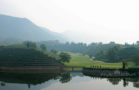Golf course and landscaped tea terraces at Fuchun Resort, archived publisher photograph